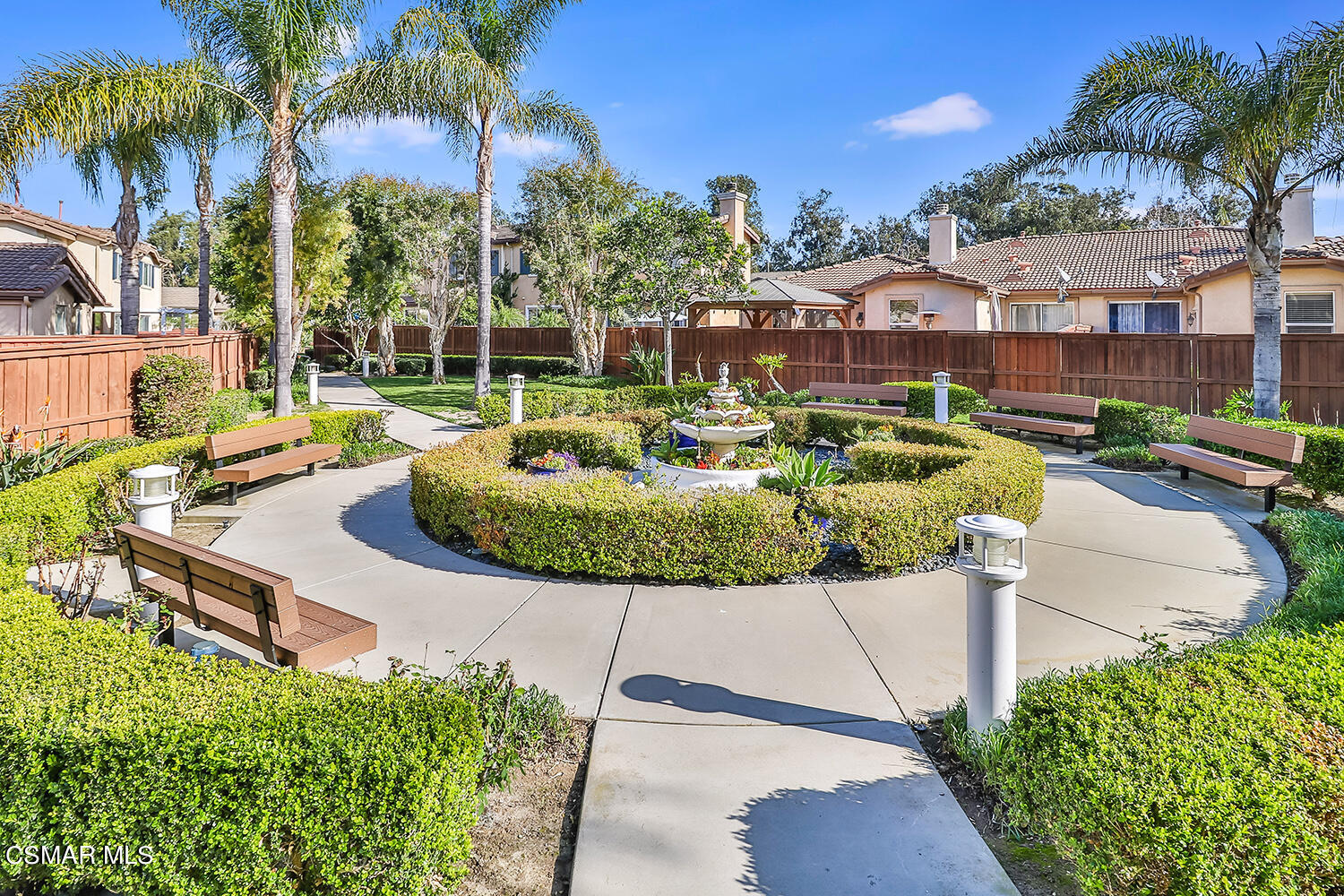 2317 Shakespeare Drive, Unit 9 Oxnard, CA 93033 - Photo 14 of 16 a view of a house with a swimming pool and a chairs
