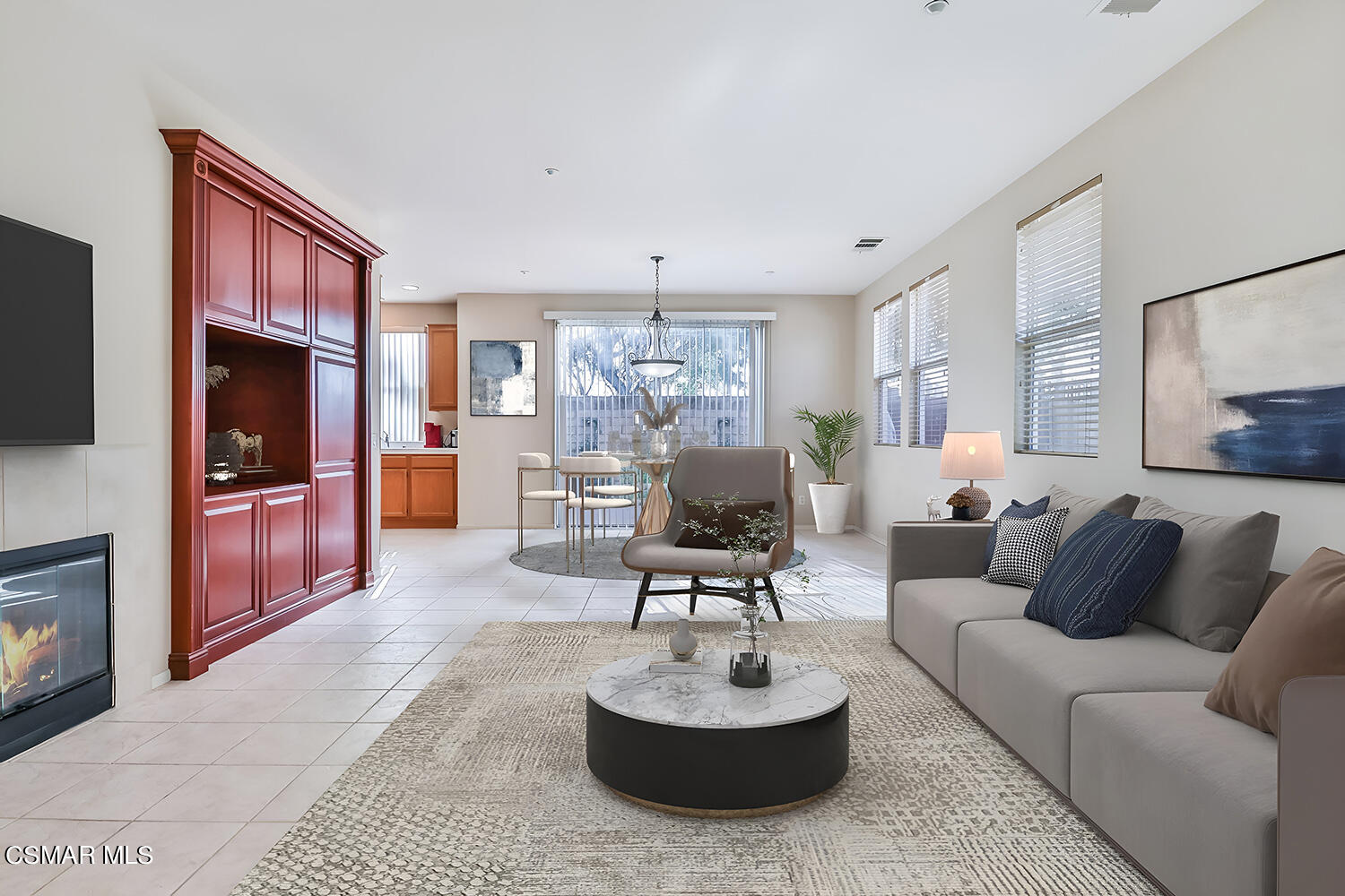 2317 Shakespeare Drive, Unit 9 Oxnard, CA 93033 - Photo 7 of 16 a living room with furniture and a flat screen tv