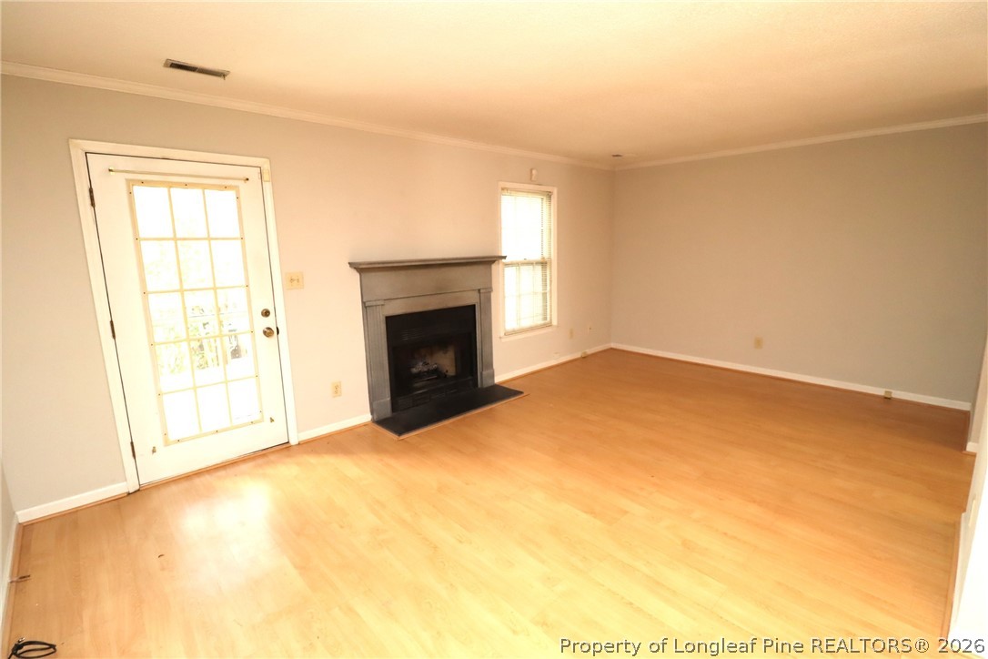 7424 Penny Hill Lane Raleigh, NC 27615 - Photo 13 of 30 an empty room with windows