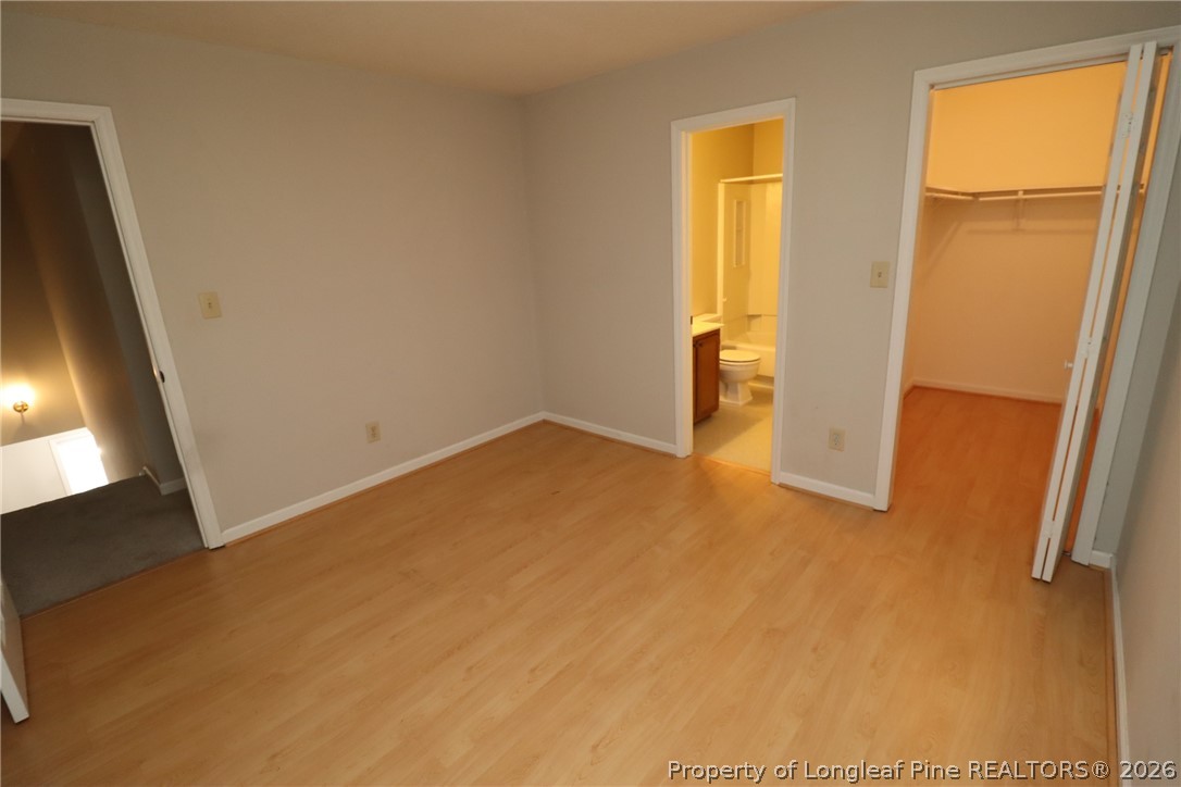 7424 Penny Hill Lane Raleigh, NC 27615 - Photo 23 of 30 a view of an empty room with a window