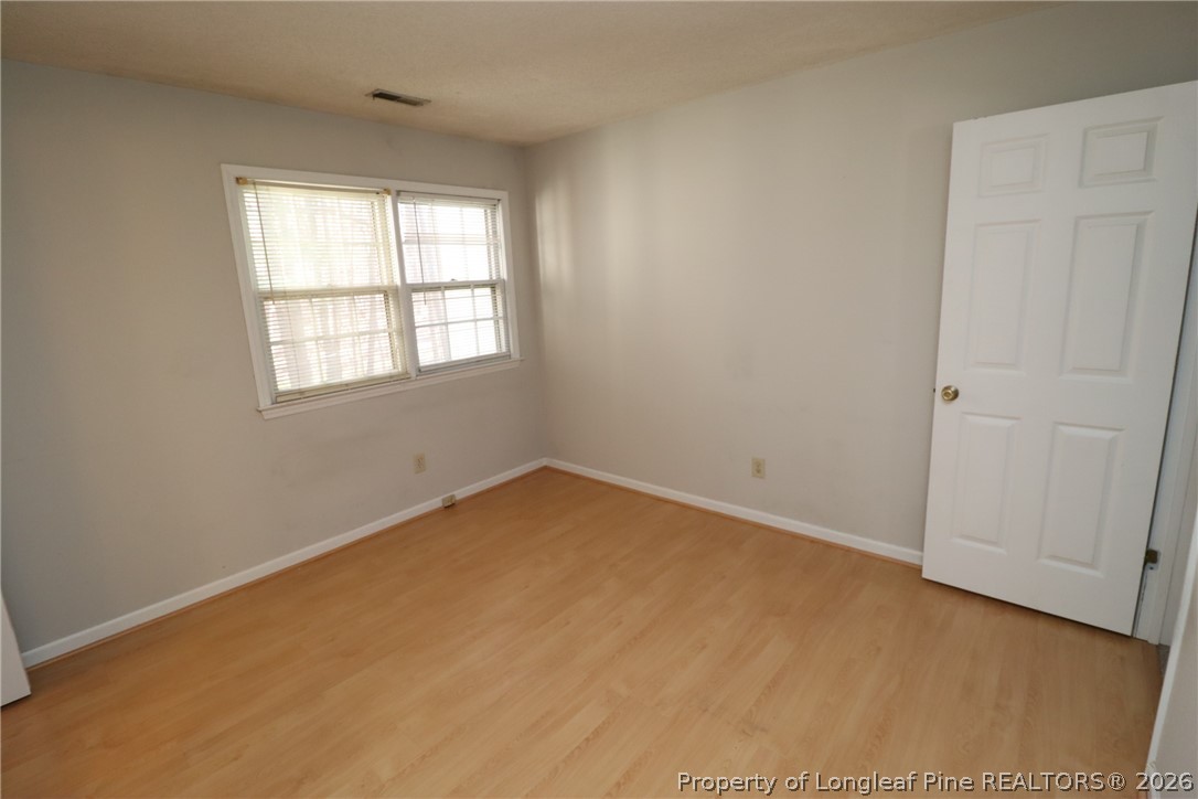 7424 Penny Hill Lane Raleigh, NC 27615 - Photo 26 of 30 an empty room with a window