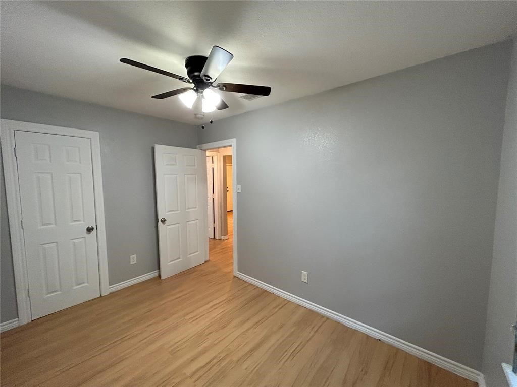6818 Weston Street, Unit 1 Houston, TX 77021 - Photo 8 of 10 wooden floor in an empty room