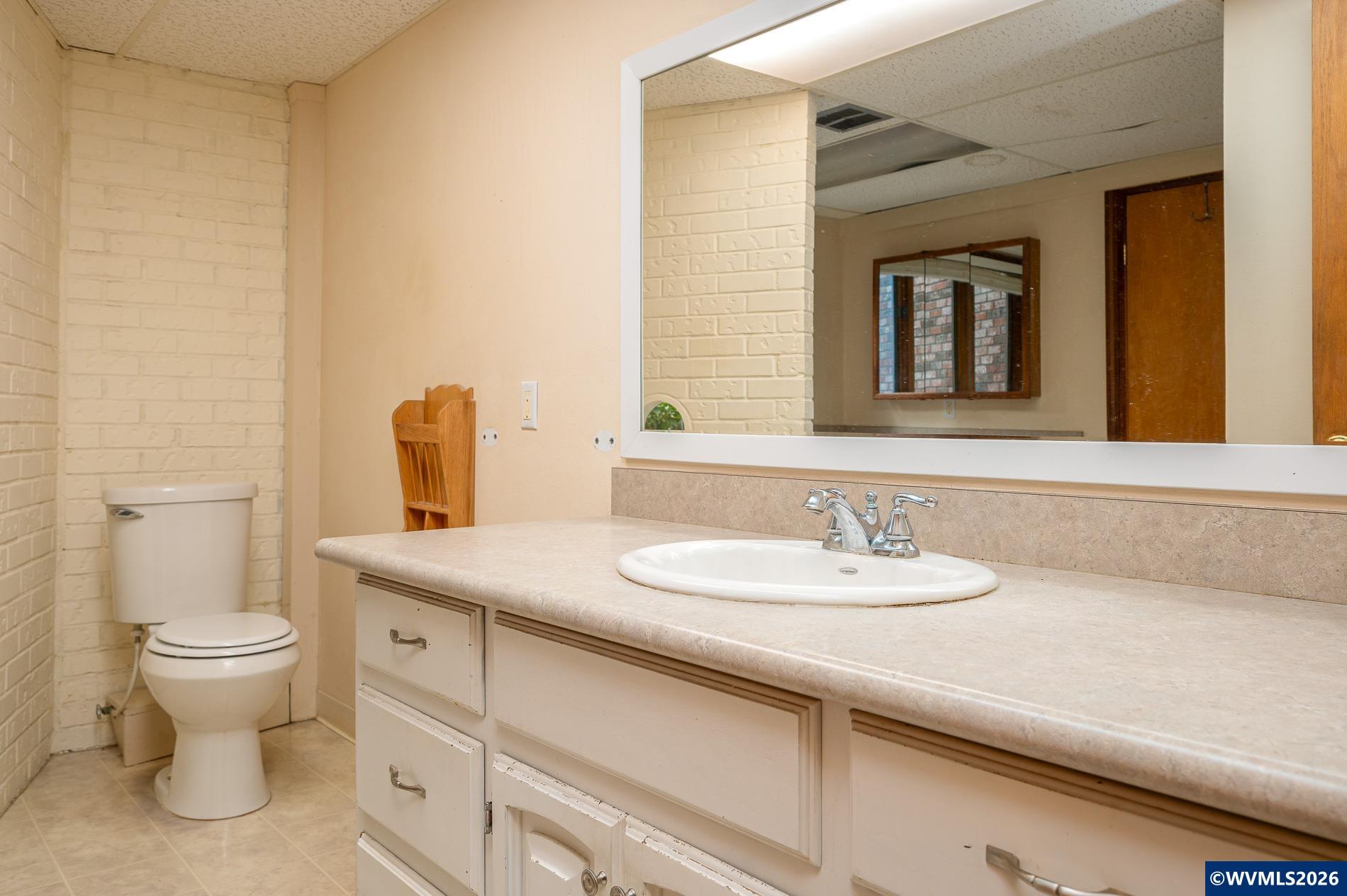 27572 South Kinzy Road Estacada, OR 97023 - Photo 42 of 50 a bathroom with a sink and a toilet