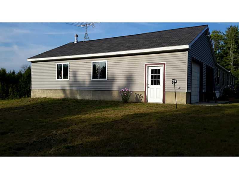 350 Transalpine Road Lincoln, ME 04457 - Photo 3 of 27 Exterior Side View. Oversized garage...