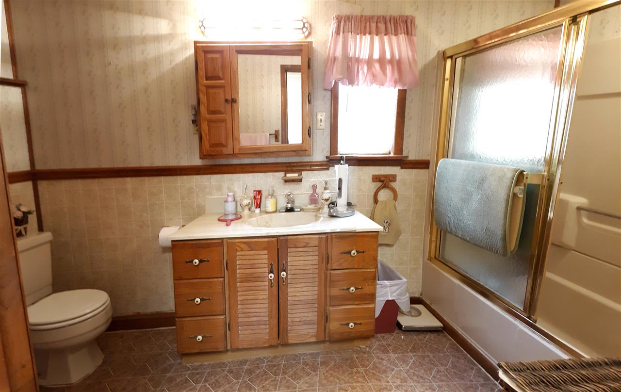 514 Oak Hill Road Staunton, VA 24401 - Photo 16 of 43 a bathroom with a sink a toilet and a mirror