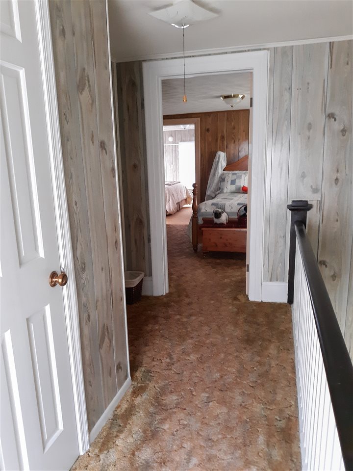 514 Oak Hill Road Staunton, VA 24401 - Photo 22 of 43 a living room with furniture and a gate