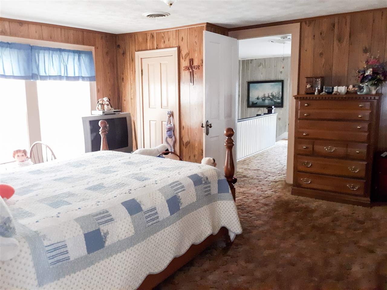 514 Oak Hill Road Staunton, VA 24401 - Photo 29 of 43 a spacious bedroom with a bed and a dresser