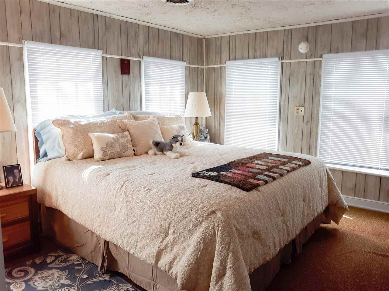 514 Oak Hill Road Staunton, VA 24401 - Photo 30 of 43 a bedroom with a bed and a window