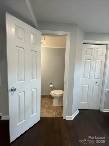 a view of a bathroom with toilet