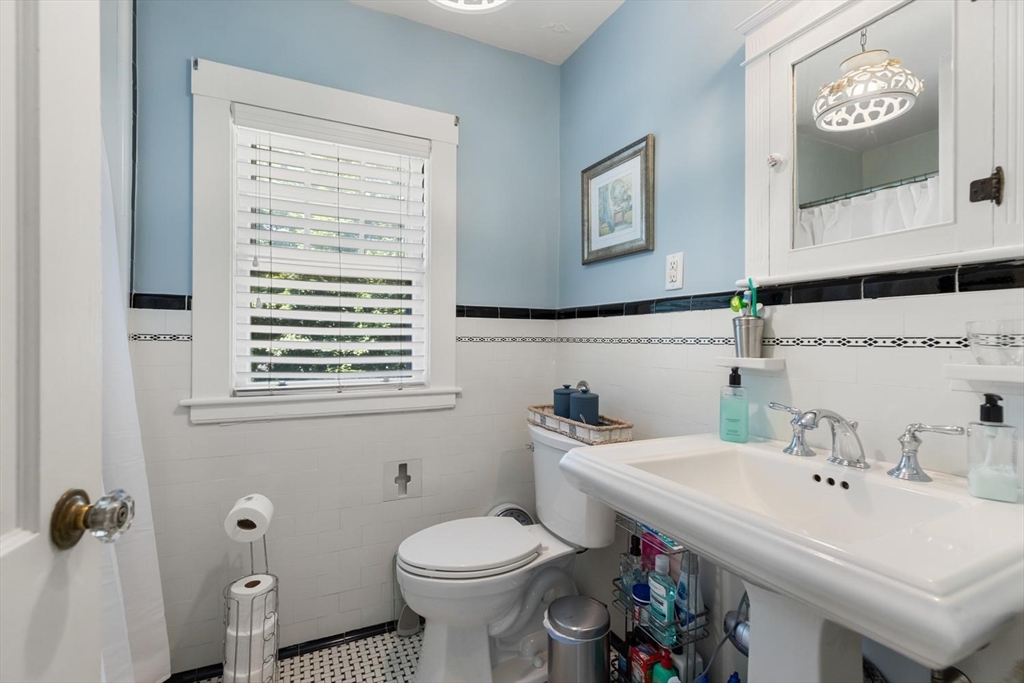 114 South Border Road Medford, MA 02155 - Photo 20 of 36 a bathroom with a sink and a toilet