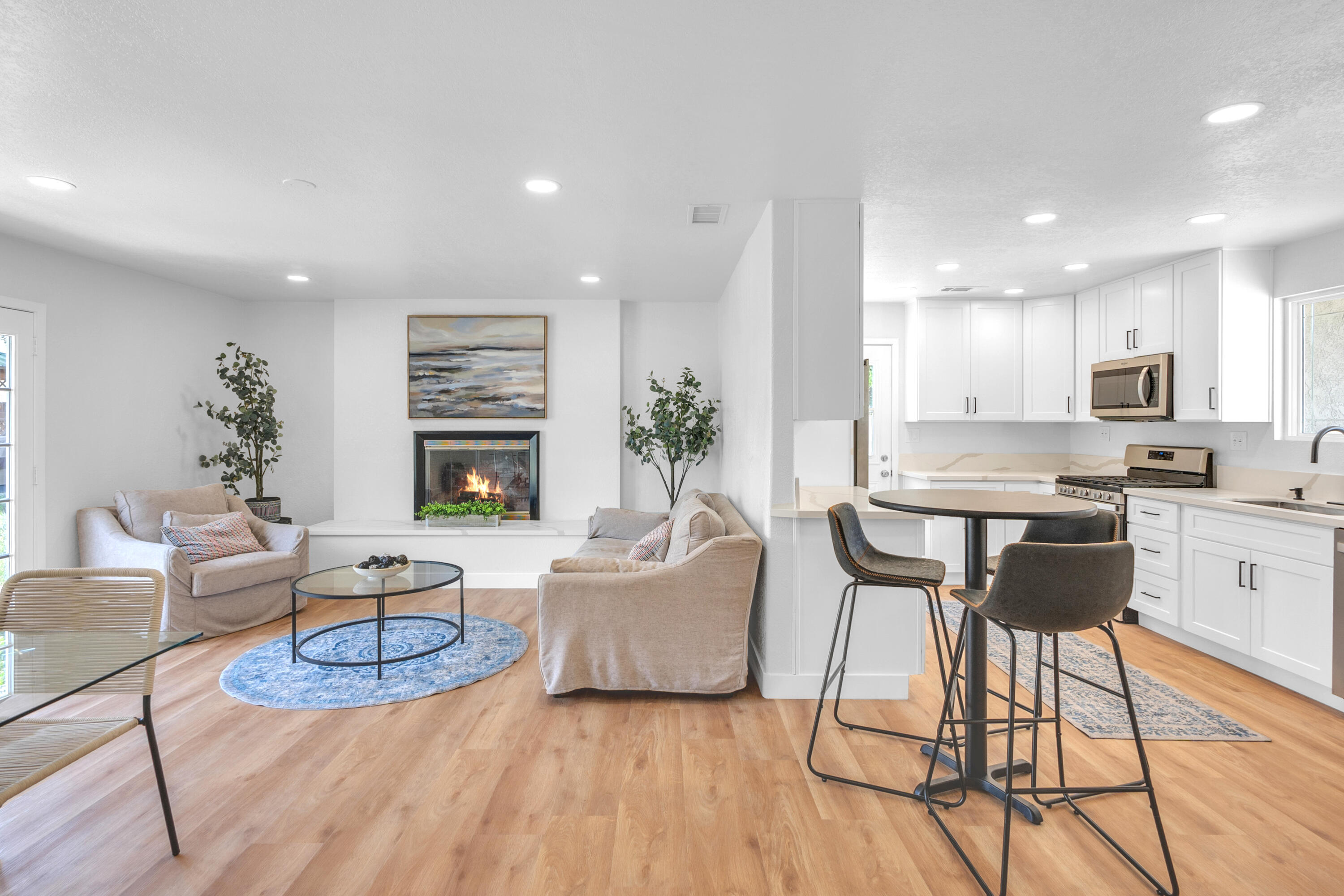 1621 Arcane Street Simi Valley, CA 93065 - Photo 18 of 63 a living room with fireplace furniture and a wooden floor