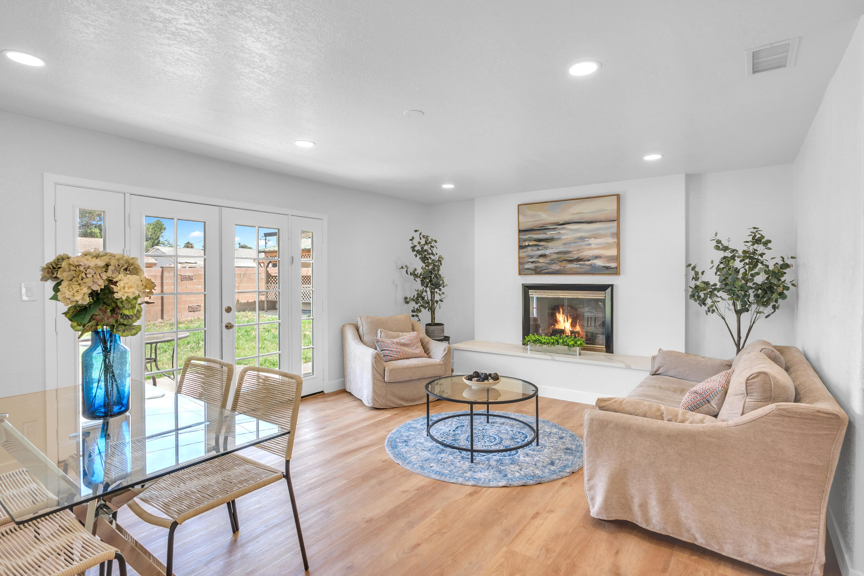 1621 Arcane Street Simi Valley, CA 93065 - Photo 19 of 63 a living room with furniture potted plant and a fireplace