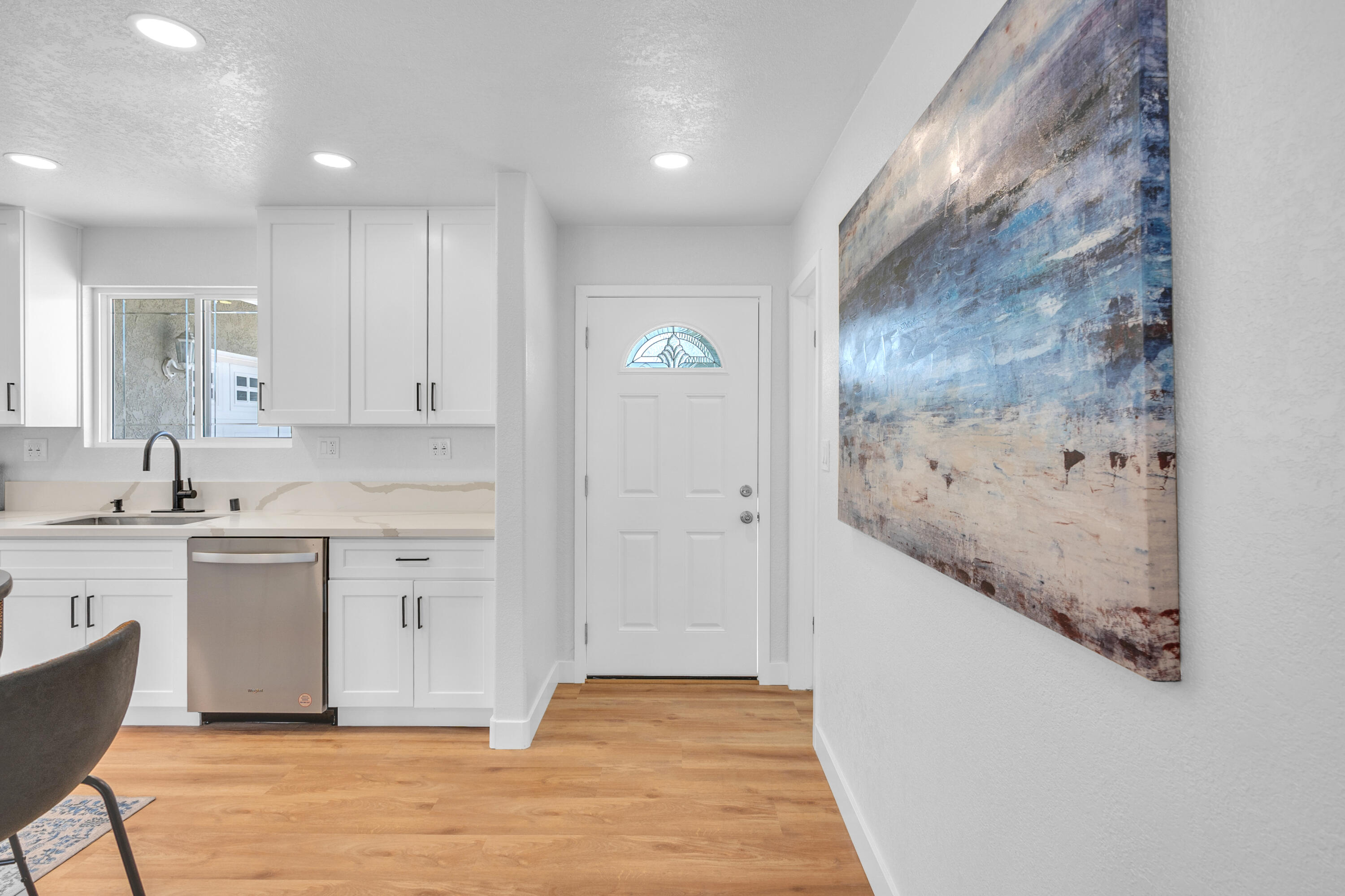 1621 Arcane Street Simi Valley, CA 93065 - Photo 20 of 63 a spacious bathroom with a granite countertop sink a mirror and a bathtub