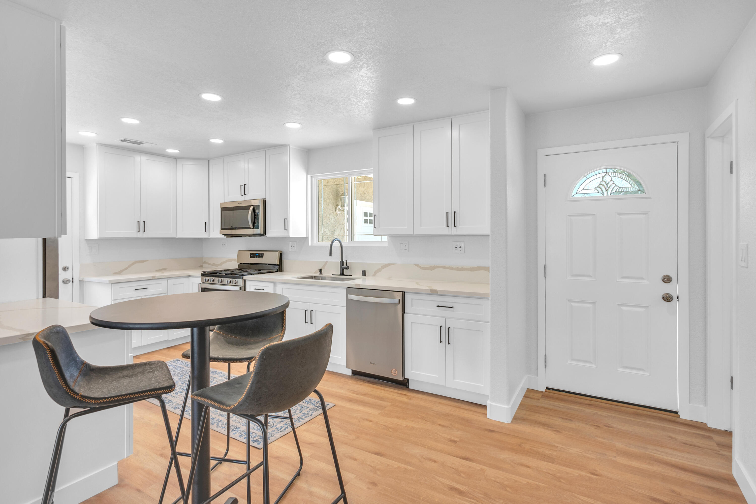1621 Arcane Street Simi Valley, CA 93065 - Photo 21 of 63 a kitchen with a sink cabinets and wooden floor