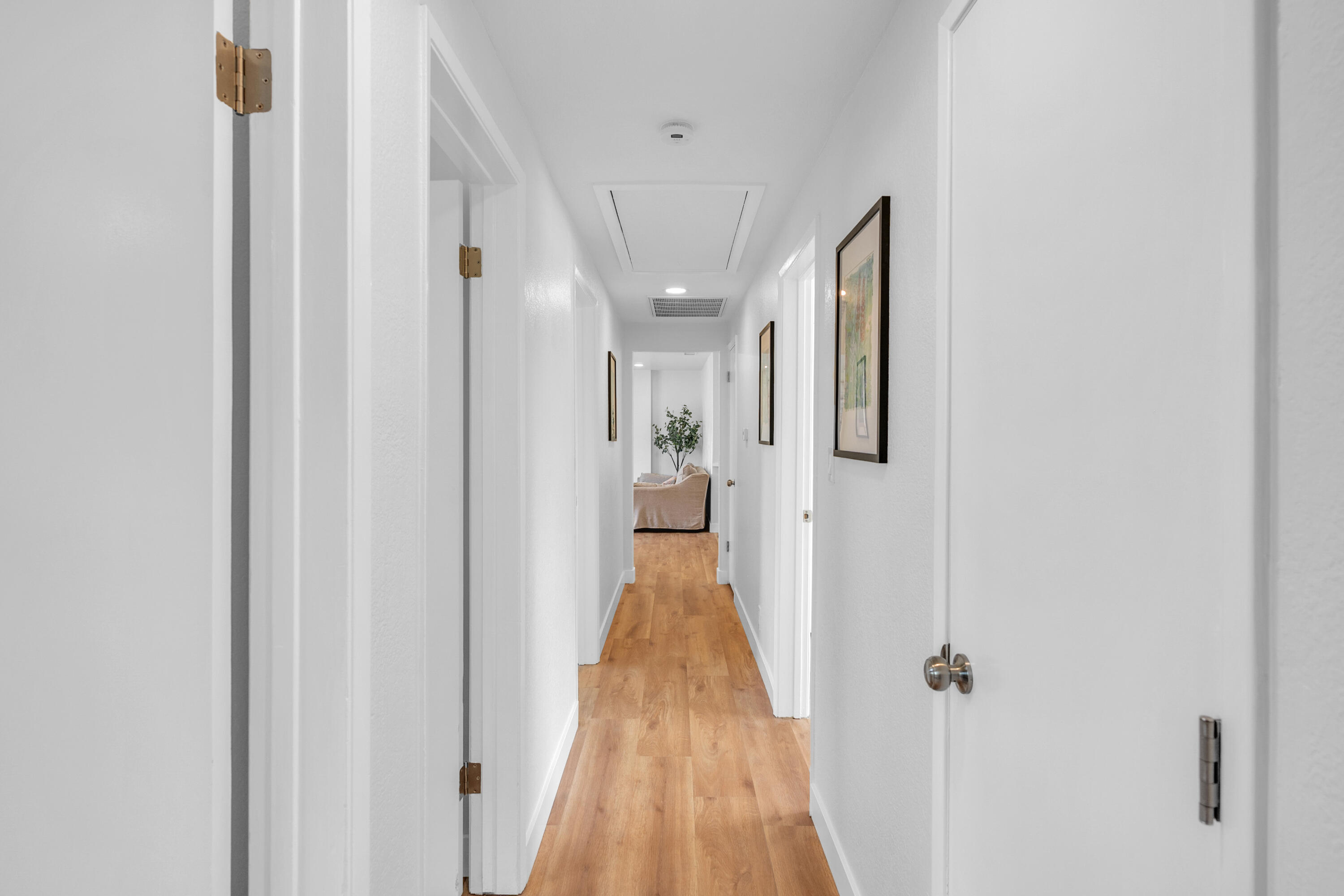 1621 Arcane Street Simi Valley, CA 93065 - Photo 22 of 63 a view of a hallway with wooden floor and staircase