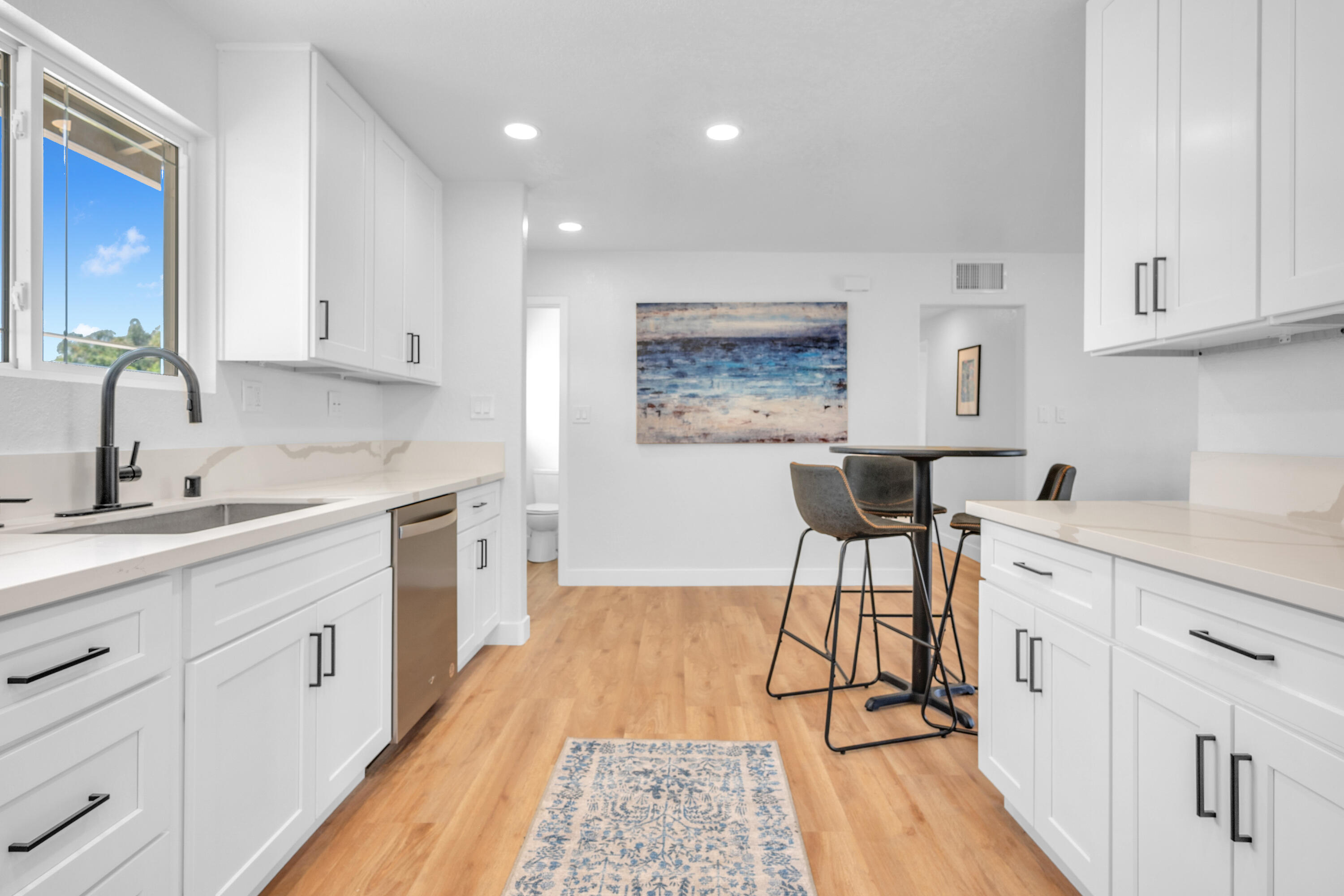 1621 Arcane Street Simi Valley, CA 93065 - Photo 23 of 63 a kitchen with a sink a counter top space and appliances
