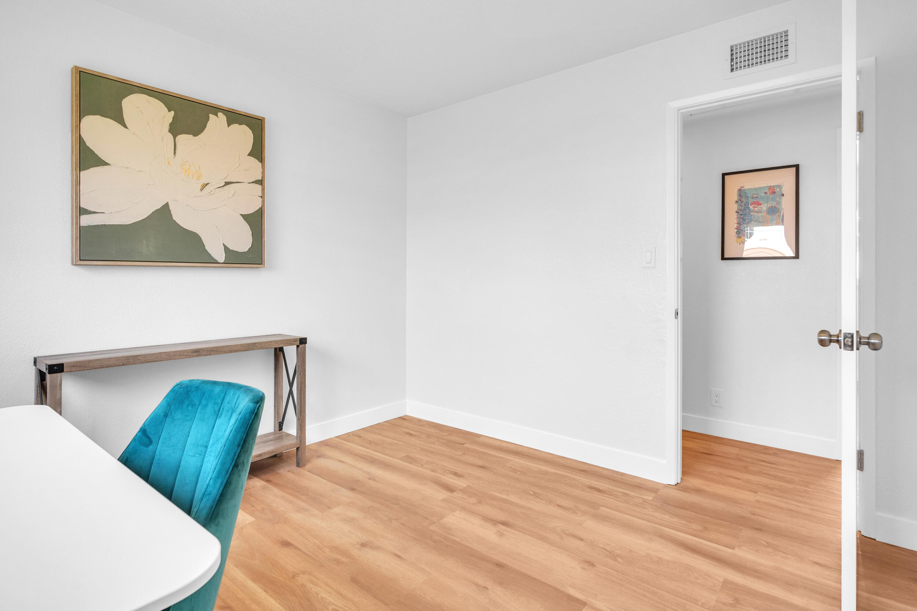 1621 Arcane Street Simi Valley, CA 93065 - Photo 32 of 63 a bedroom with a bed and a painting on the wall