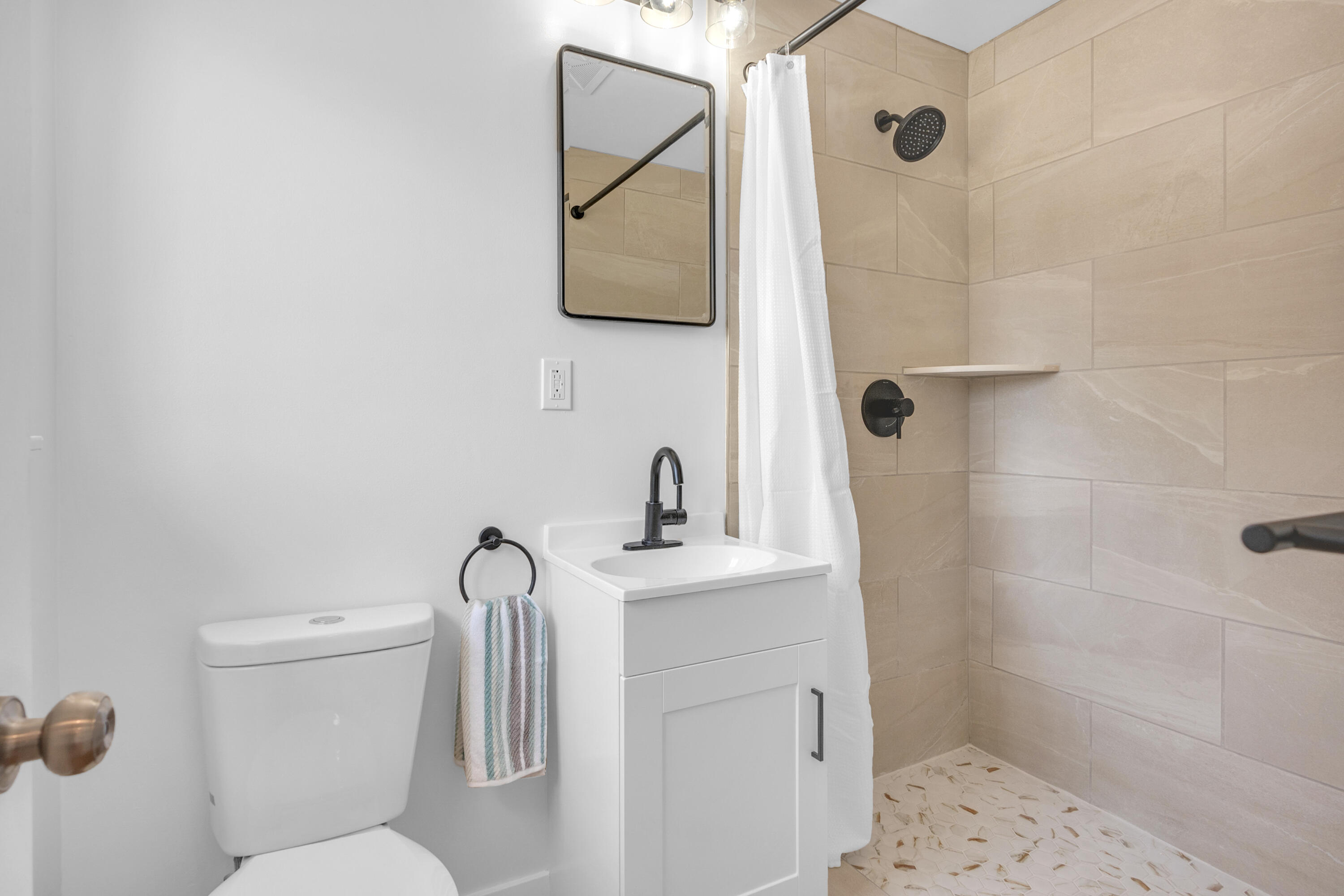 1621 Arcane Street Simi Valley, CA 93065 - Photo 39 of 63 a bathroom with a toilet sink and shower