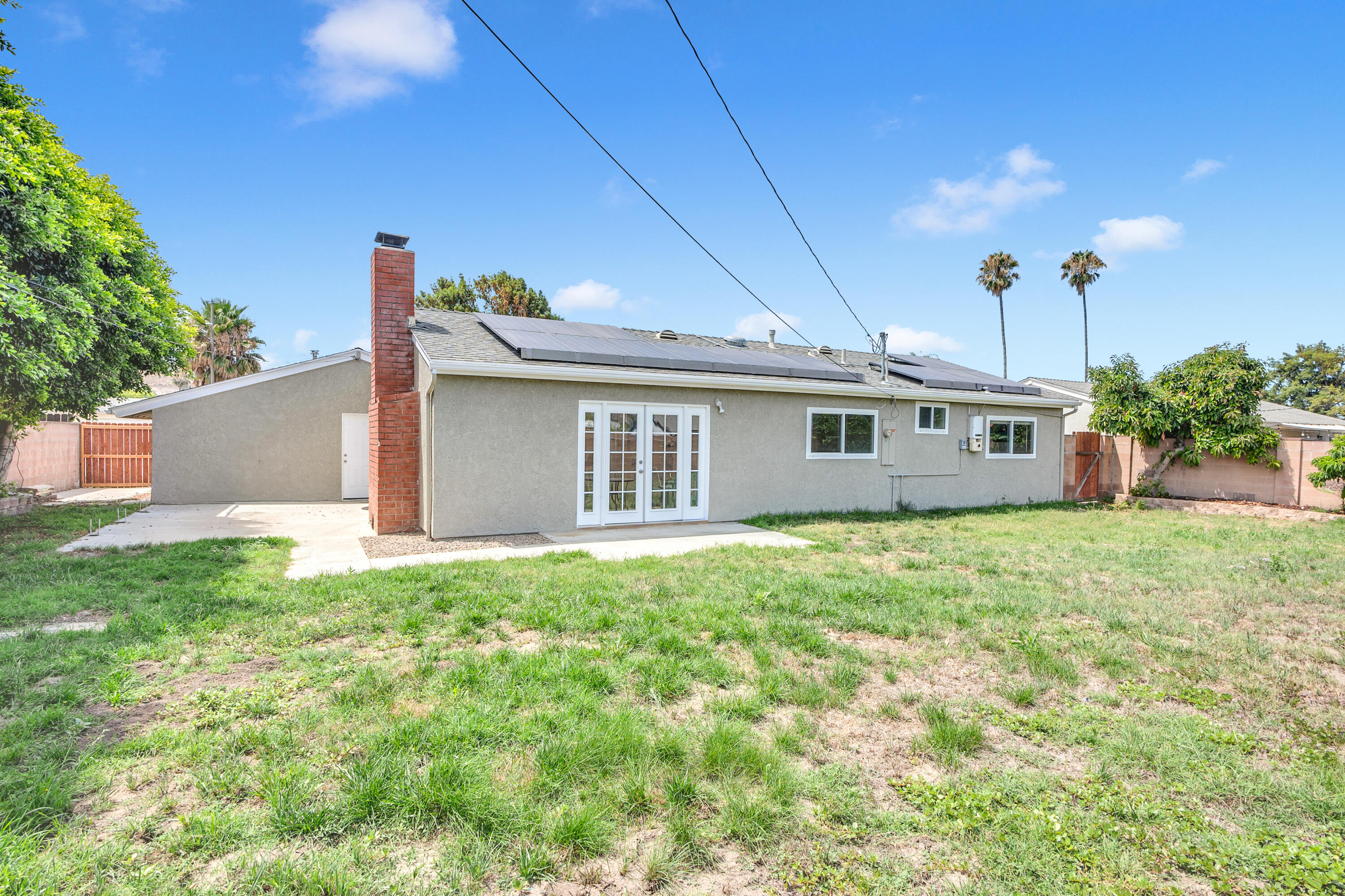 1621 Arcane Street Simi Valley, CA 93065 - Photo 43 of 63 a view of a house with backyard and a garden