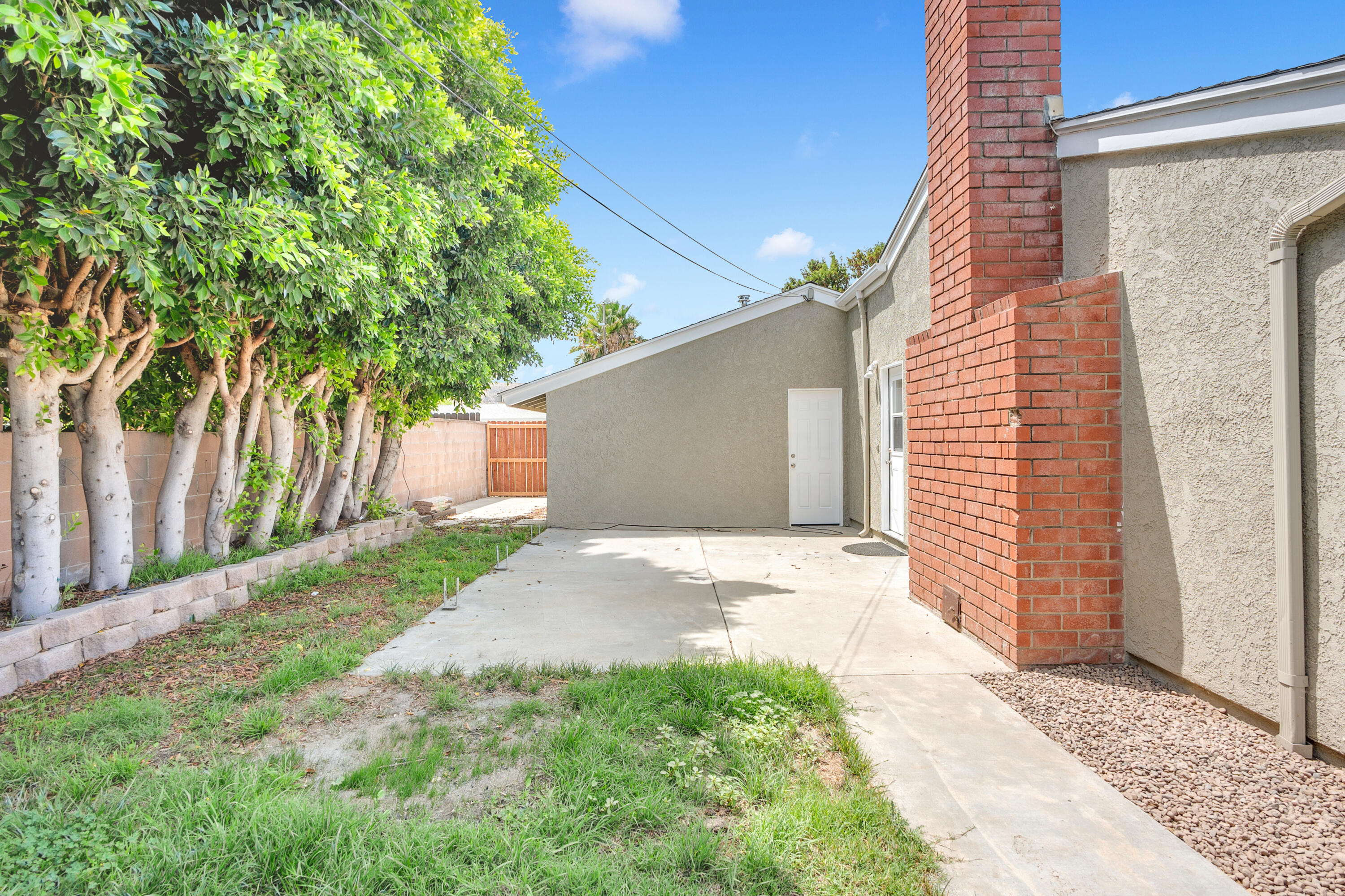 1621 Arcane Street Simi Valley, CA 93065 - Photo 44 of 63 a front view of a house with a yard and garage
