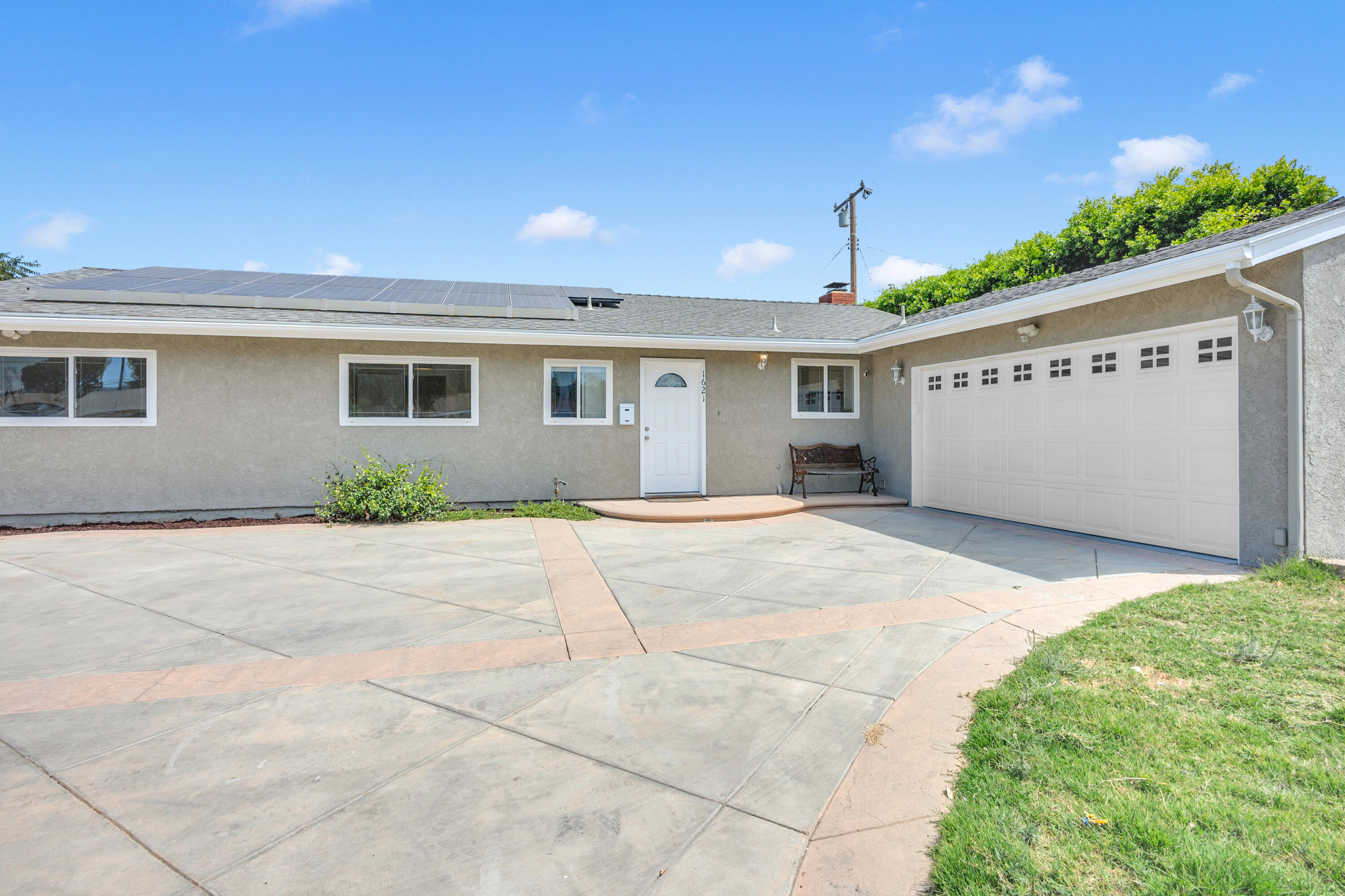 1621 Arcane Street Simi Valley, CA 93065 - Photo 52 of 63 a view of the house with a yard and potted plants