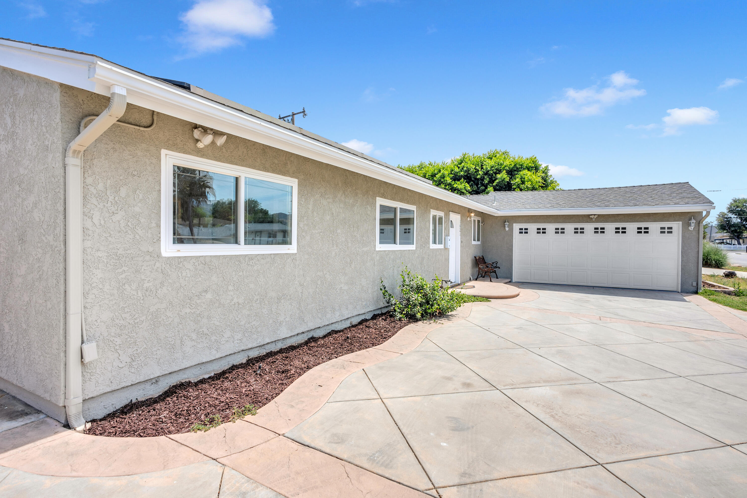 1621 Arcane Street Simi Valley, CA 93065 - Photo 54 of 63 a view of a house with a yard and potted plants