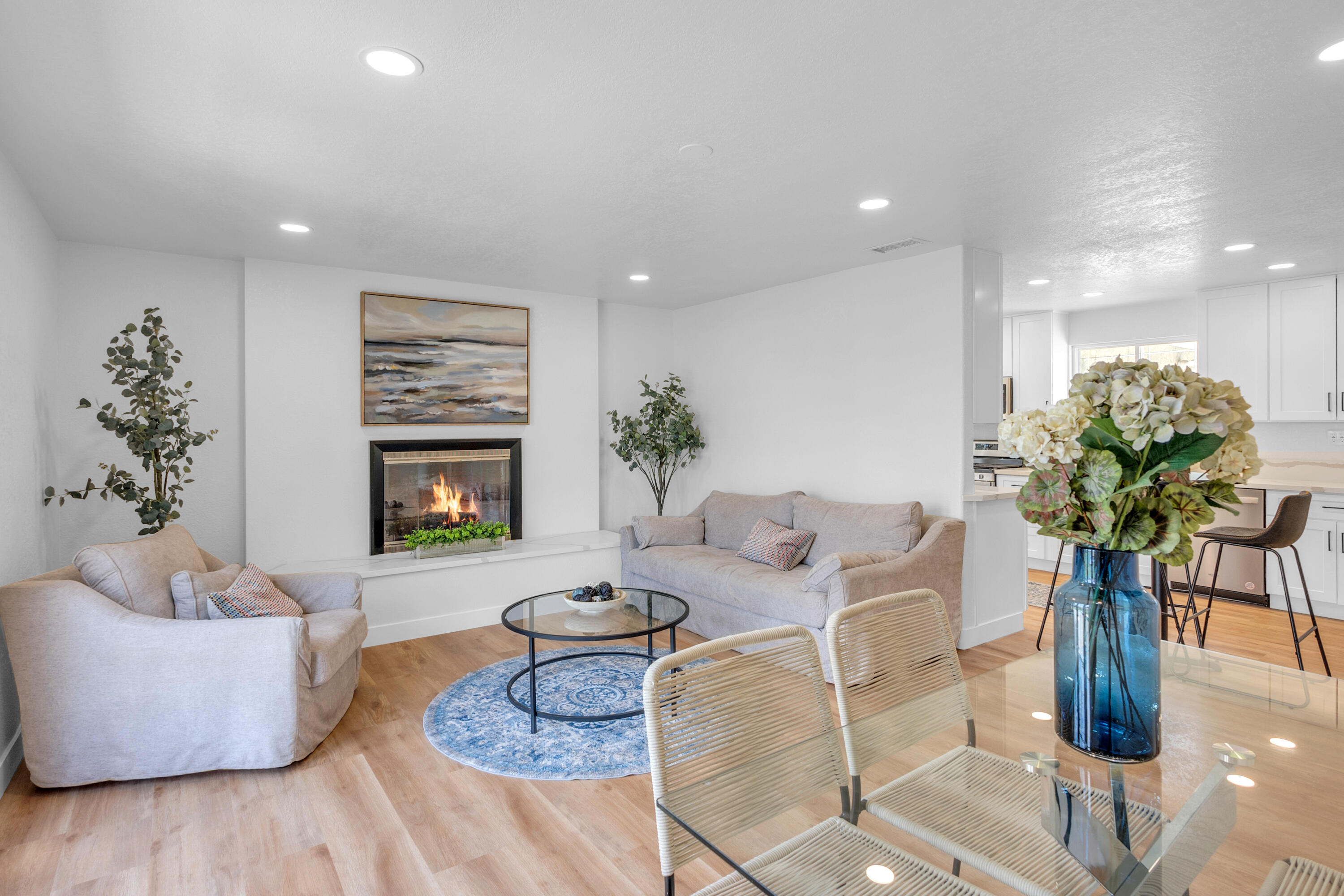 1621 Arcane Street Simi Valley, CA 93065 - Photo 6 of 63 a living room with furniture potted plant and a fireplace