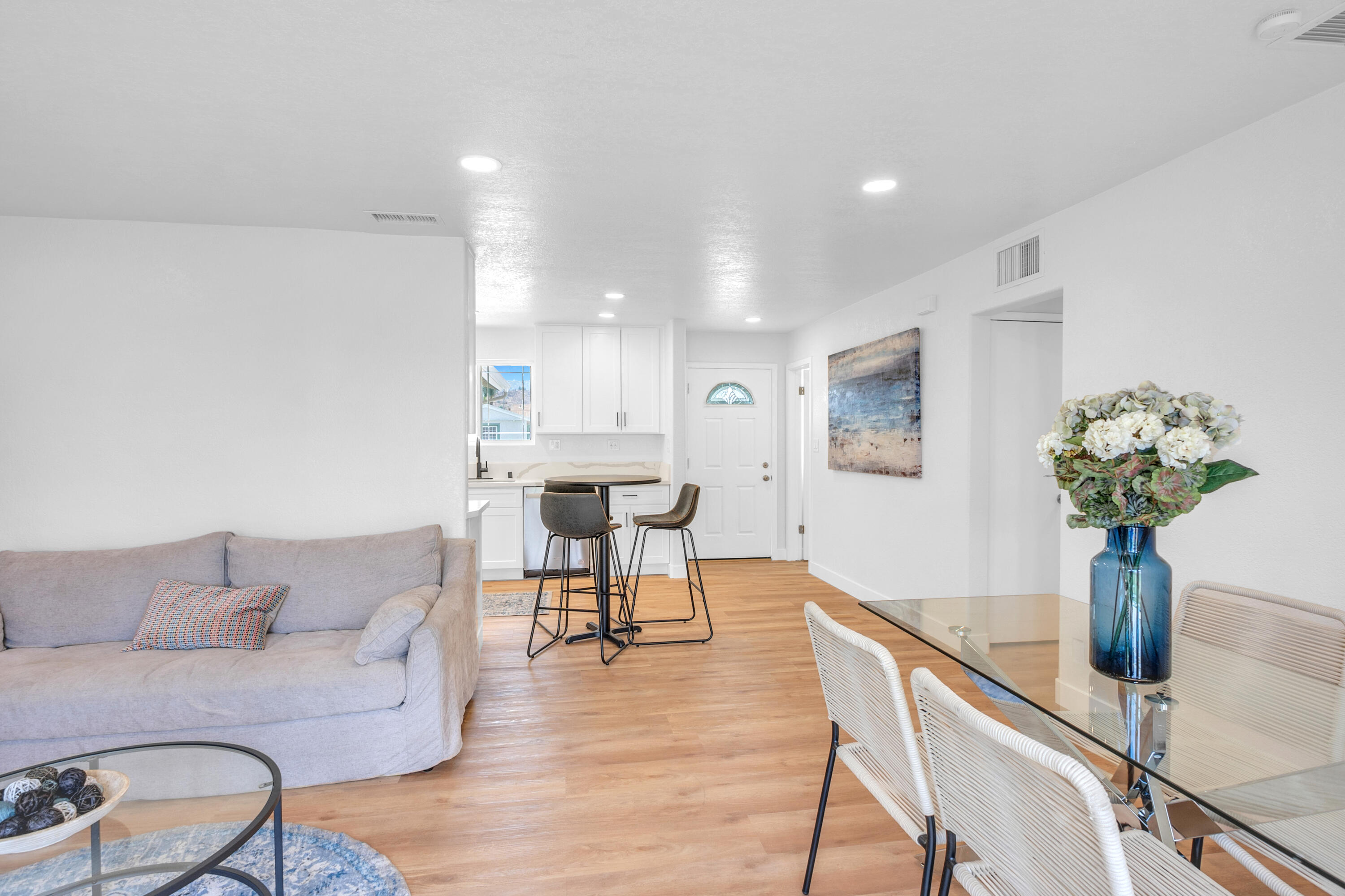 1621 Arcane Street Simi Valley, CA 93065 - Photo 8 of 63 a living room with furniture flowerpot and a chandelier