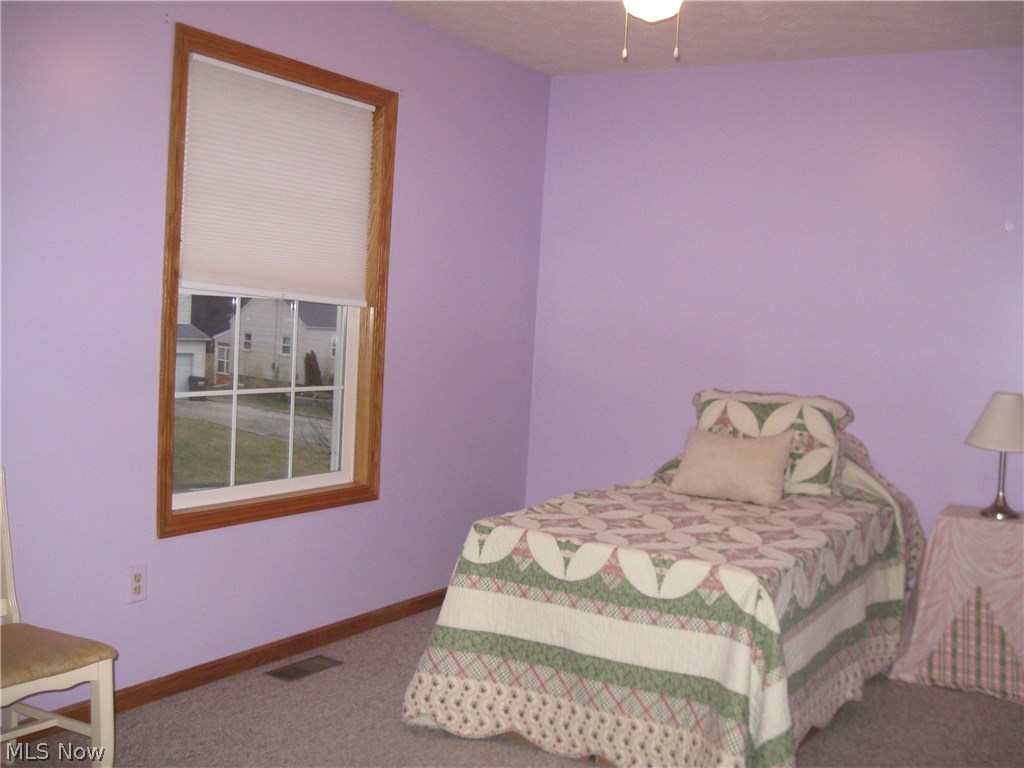 52 Beech Street Rittman, OH 44270 - Photo 7 of 35 Comfortable-size bedrooms.