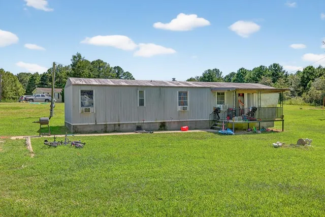 a house view with a outdoor space