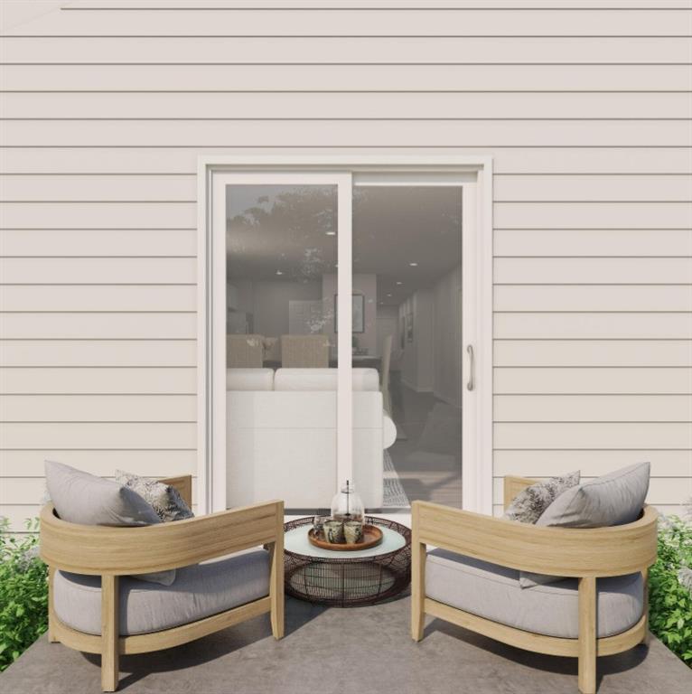 309 Victory Drive Mabank, TX 75147 - Photo 16 of 37 a living room with a couch and a potted plant