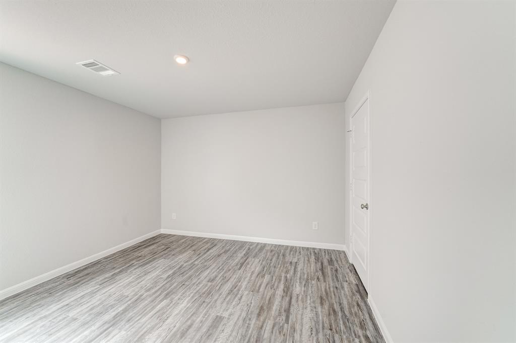 309 Victory Drive Mabank, TX 75147 - Photo 31 of 37 a view of room with wooden floor