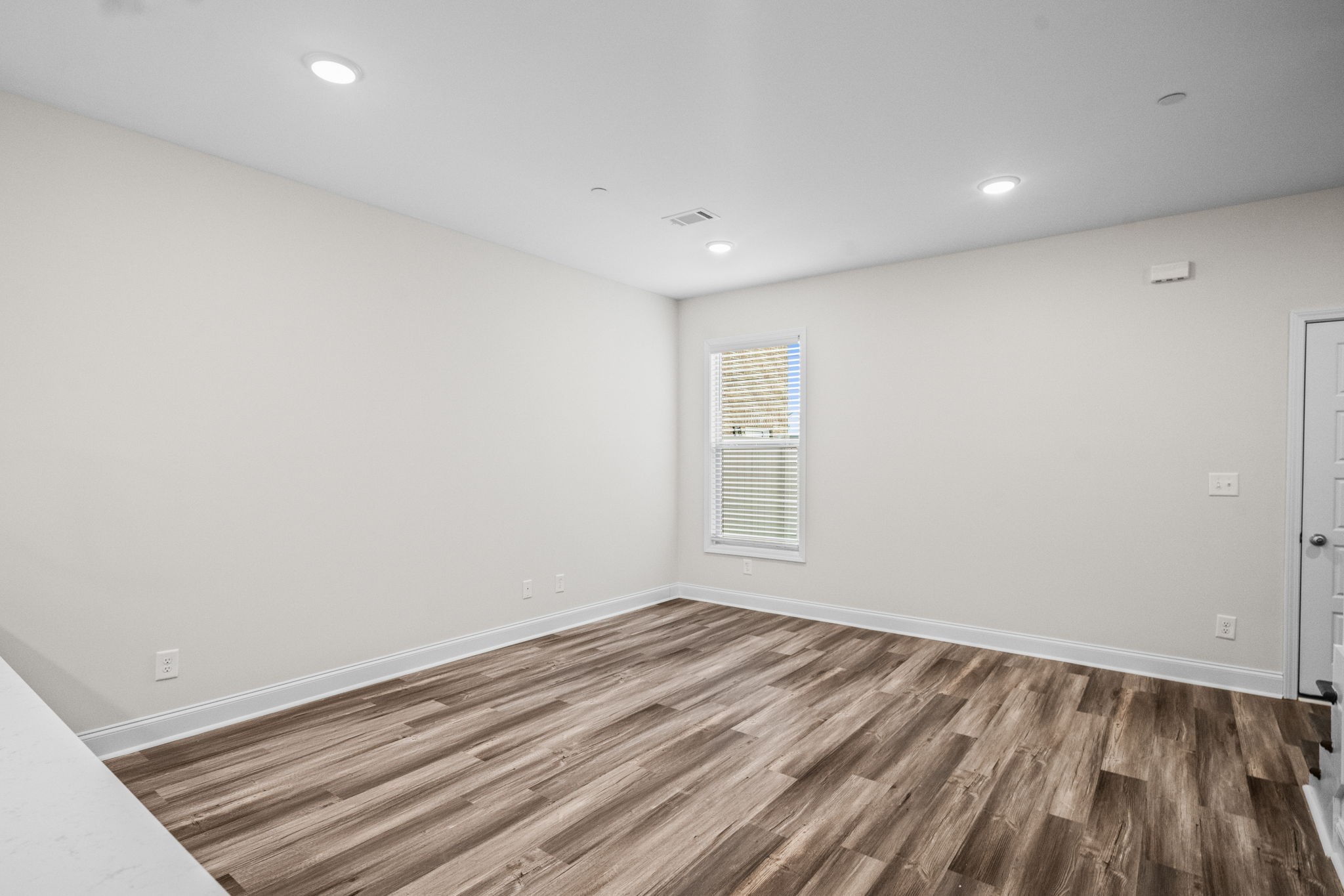 214 Franklin Street Pleasant View, TN 37146 - Photo 16 of 30 a view of room with window and wooden floor