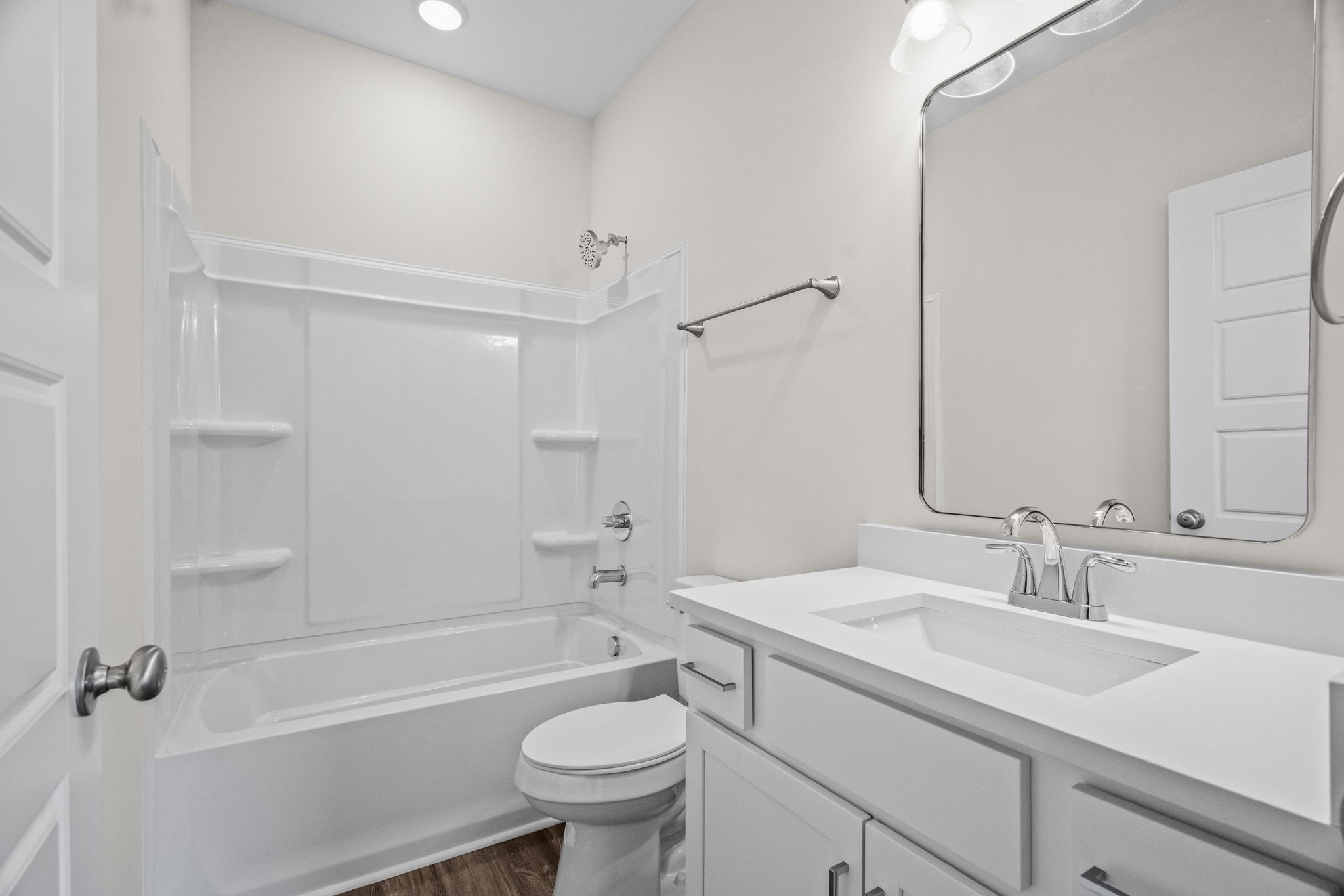 214 Franklin Street Pleasant View, TN 37146 - Photo 9 of 30 a bathroom with a sink toilet a bathtub and vanity
