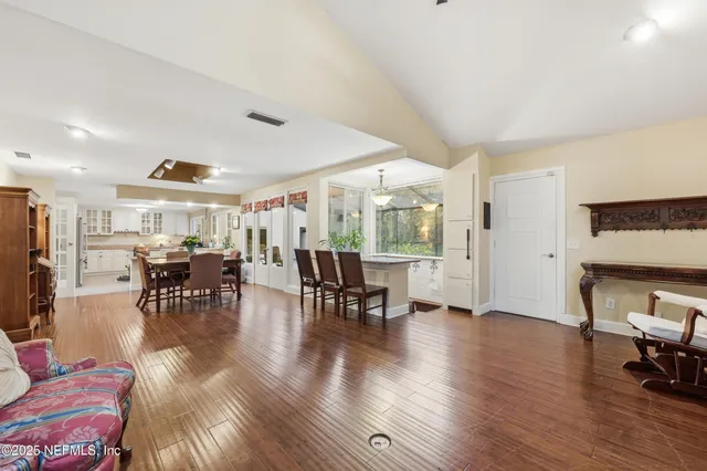 a view of a balcony with wooden floor