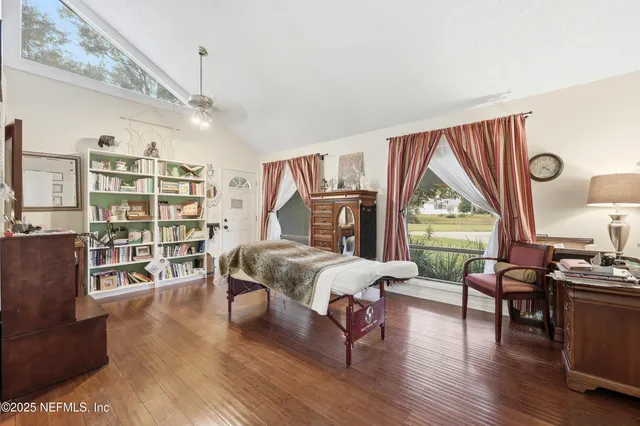 a view of a living room and bathroom
