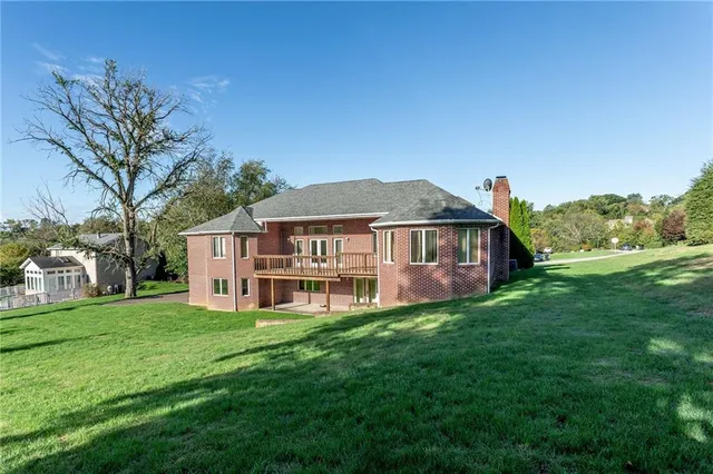 a view of a house with a big yard