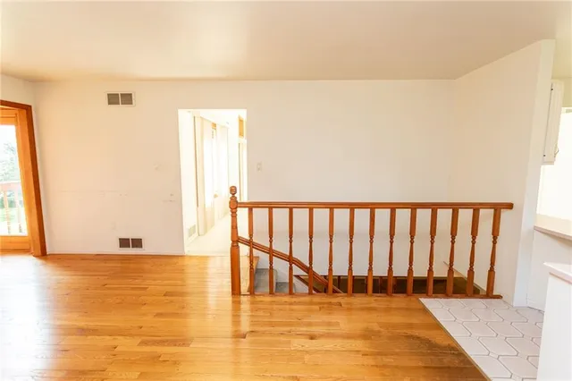 a view of swimming pool with wooden floor