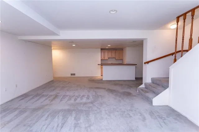 a view of a kitchen with a sink and a dishwasher