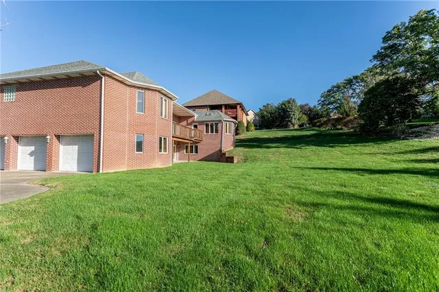 a view of a house with a big yard