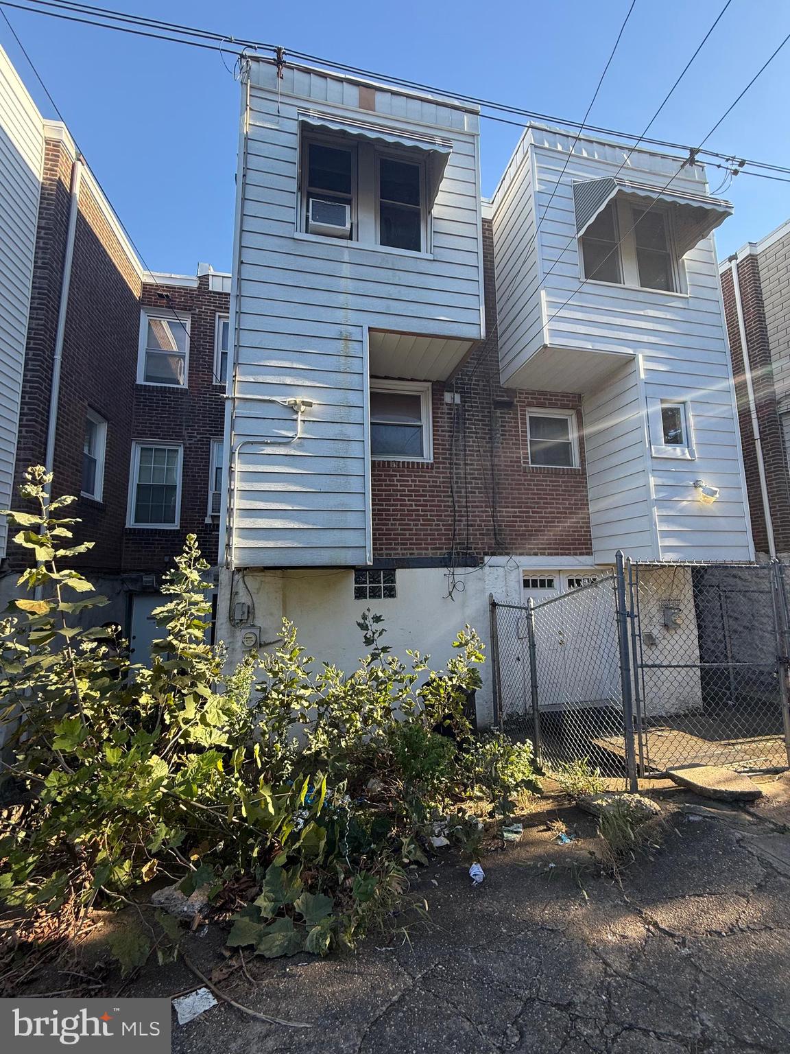 7146 Marsden Street Philadelphia, PA 19135 - Photo 21 of 22 a view of a house with a yard