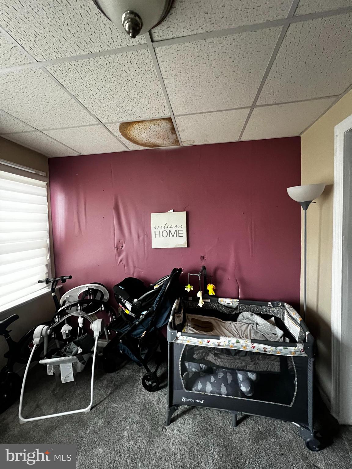 7146 Marsden Street Philadelphia, PA 19135 - Photo 6 of 22 a room with furniture and musical instruments