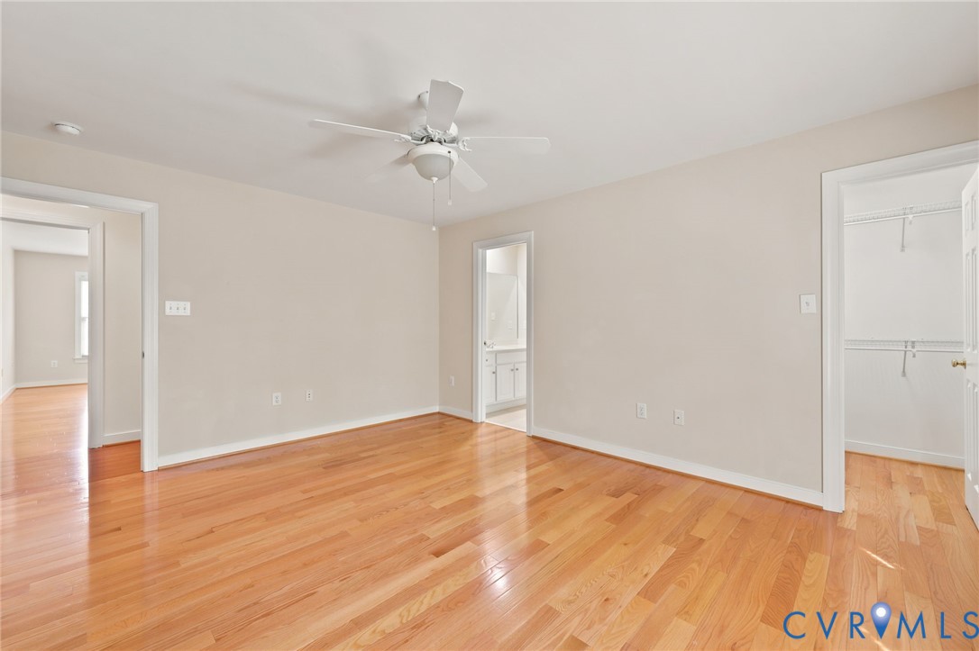 4701 Regal Oaks Road Glen Allen, VA 23059 - Photo 37 of 60 a view of an empty room with wooden floor