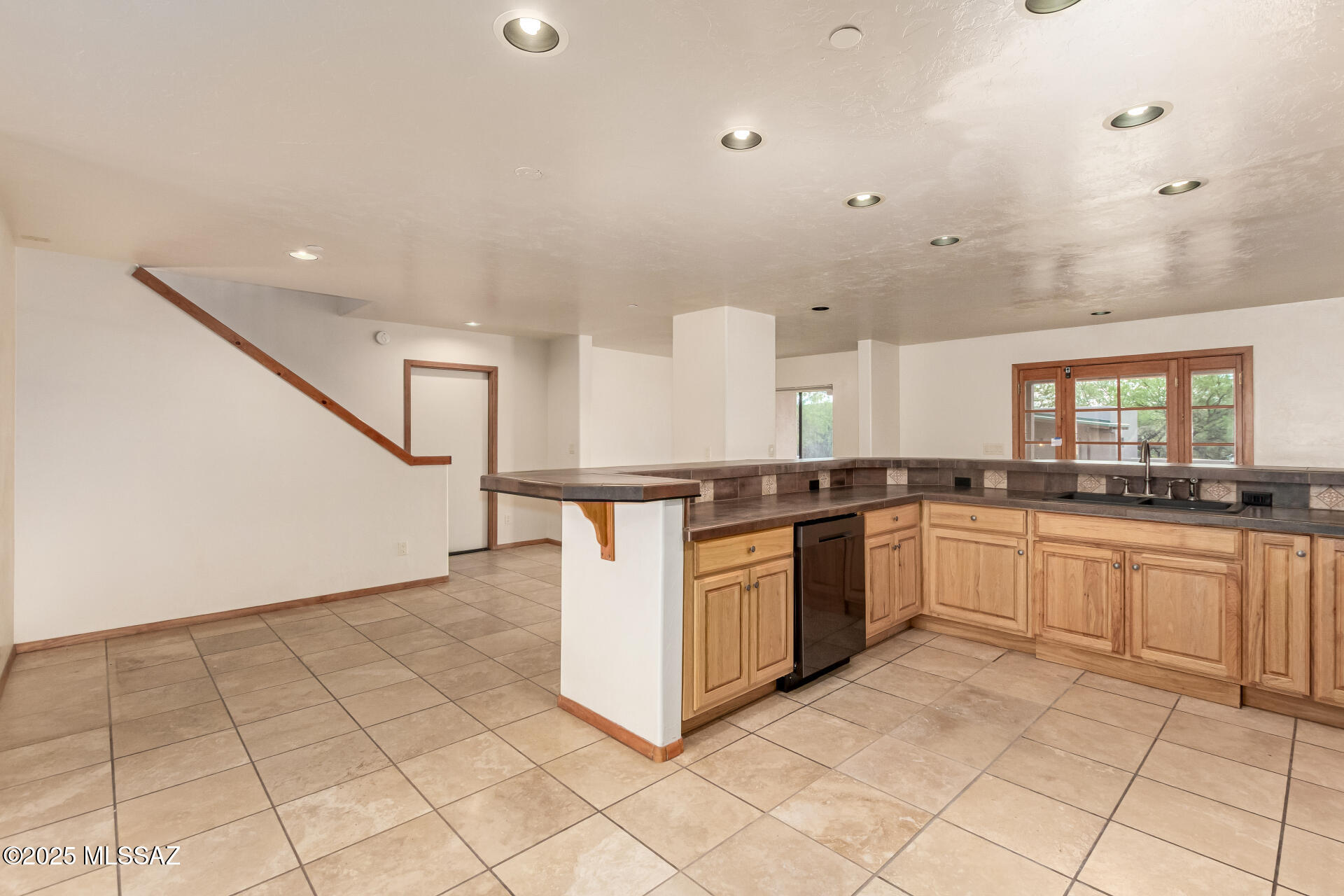 5100 East Golder Ranch Drive Tucson, AZ 85739 - Photo 16 of 47 Kitchen with doors to garage and pool
