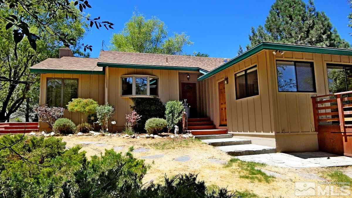 822 Foothill Road Gardnerville, NV 89460 - Photo 1 of 1 a front view of a house with a yard