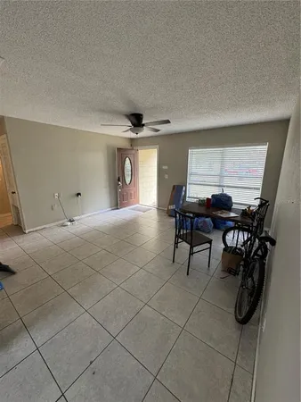 a room with furniture and a window