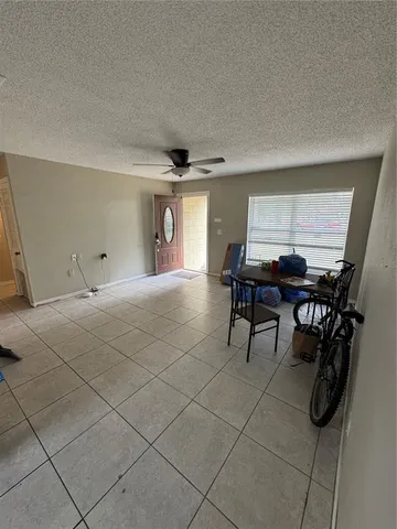 a room with furniture and a window