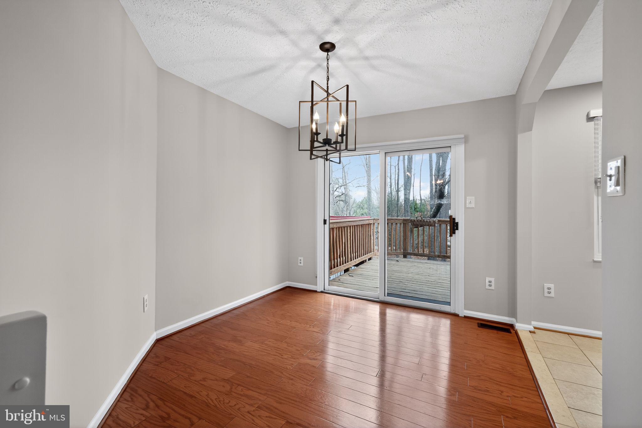 808 Suffield Drive Gaithersburg, MD 20878 - Photo 7 of 25 dining room with slider to deck