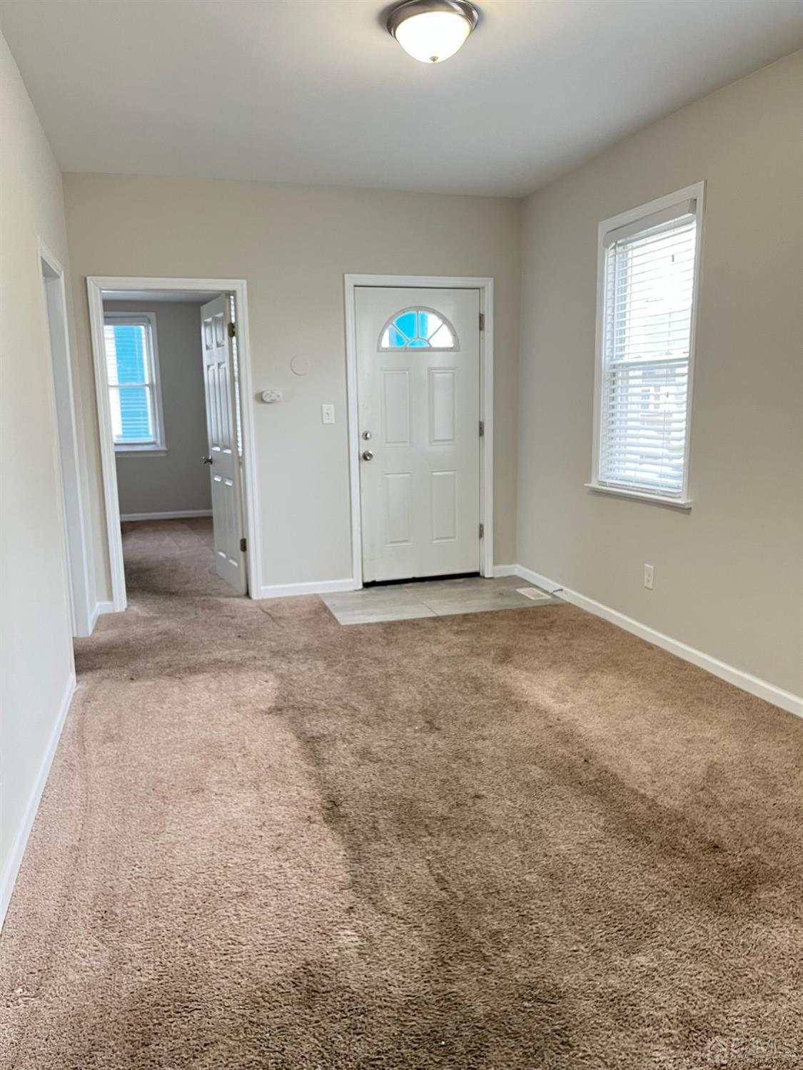37 Thomas Street Perth Amboy, NJ 08861 - Photo 12 of 30 an empty room with windows