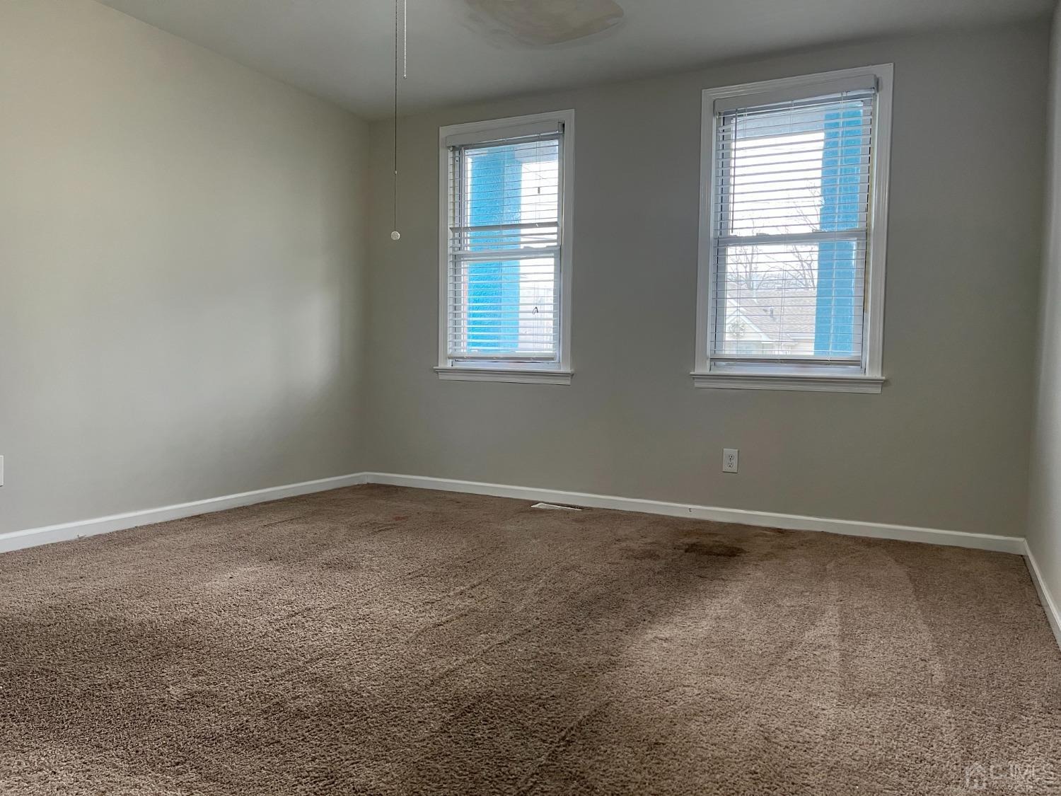 37 Thomas Street Perth Amboy, NJ 08861 - Photo 13 of 30 an empty room with a window